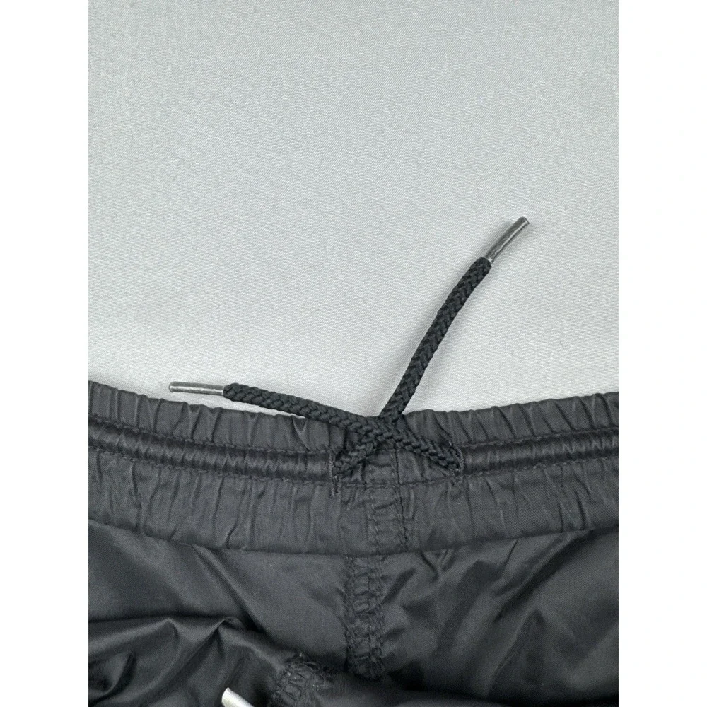 Vintage 90s Nike Black Nylon Track Pants Swoosh Zip Leg Windbreaker L